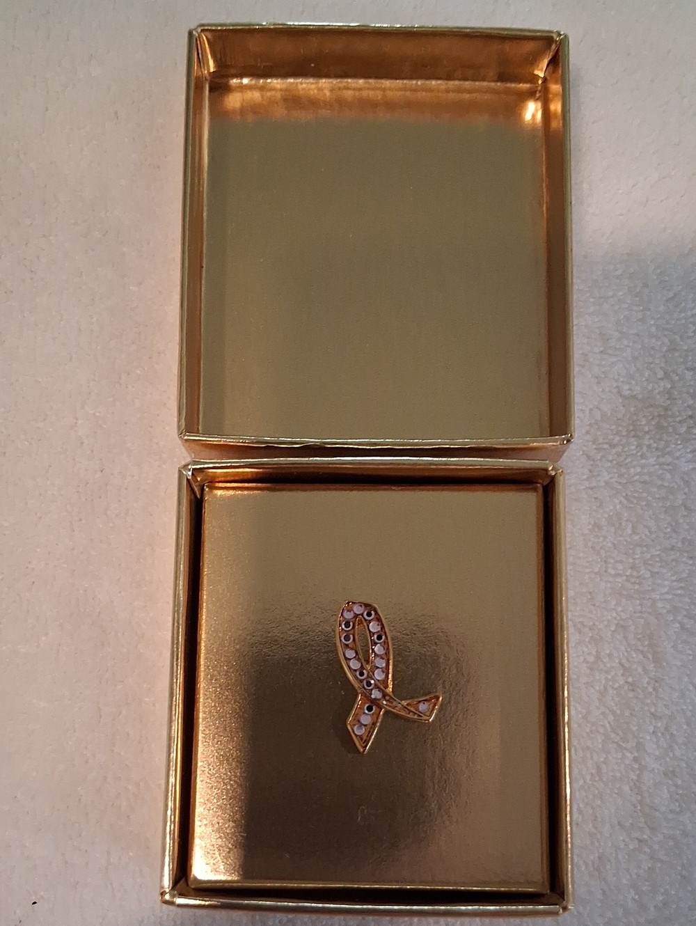 Estee Lauder Gold Ribbon Brooch with Clear Crystals